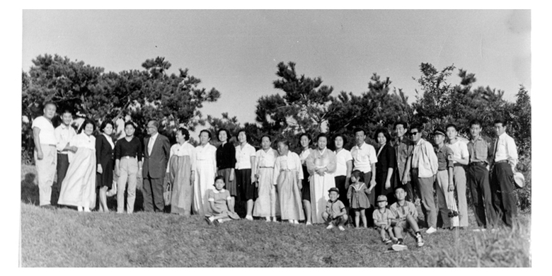 Family photograph from Korea in the 1950s showing the artist's Korean family, including his father, grandparents, aunts and uncles