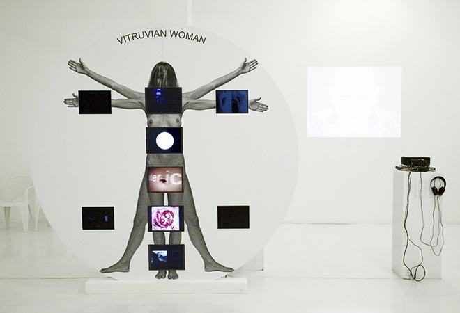 Photograph documenting the installation of The Vitruvian Woman Video Project in Turin, Italy, in 2009
